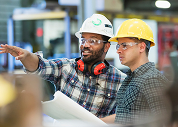 Workers wearing safety gear
